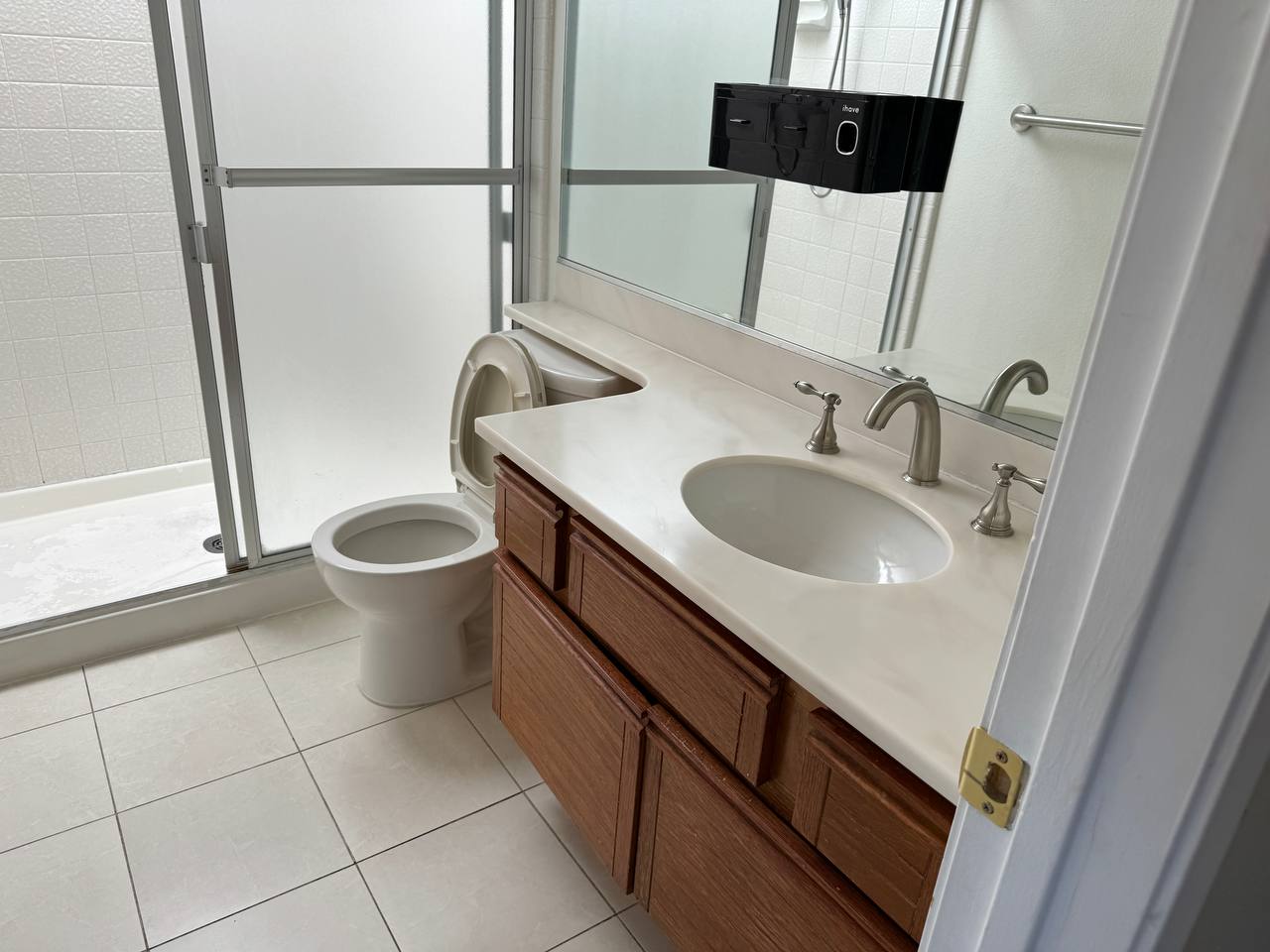 Clean bathroom with a modern sink and mirror.